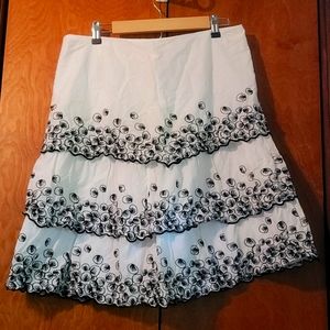 white and black patterned skirt